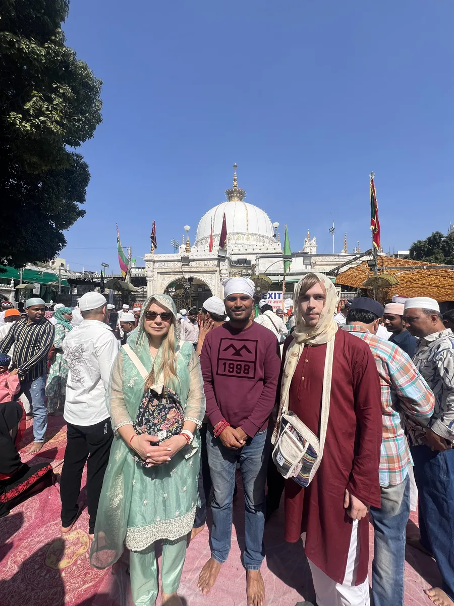 Manish with guests outside a landmark in Ajmer