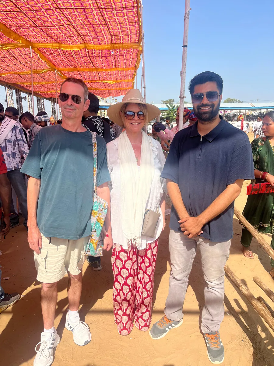 Guests visit the Pushkar Camel Fair with their guide