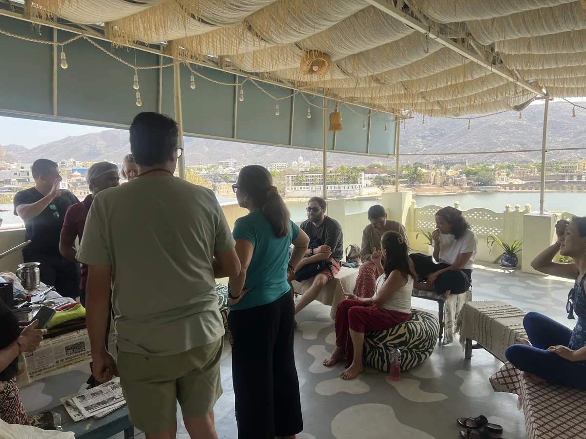 Guests cook together during a local class in Pushkar