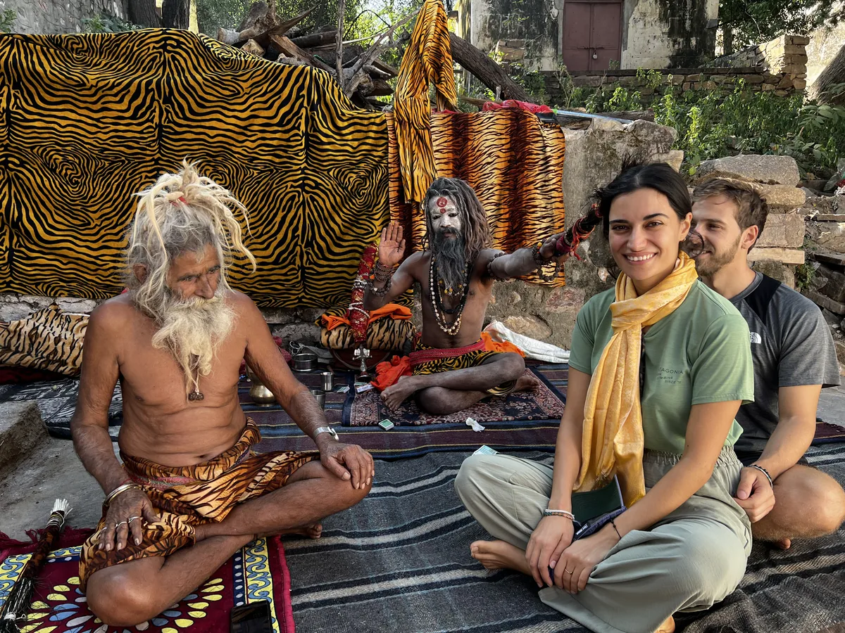 Visitors meet a spiritual teacher at a hillside ashram