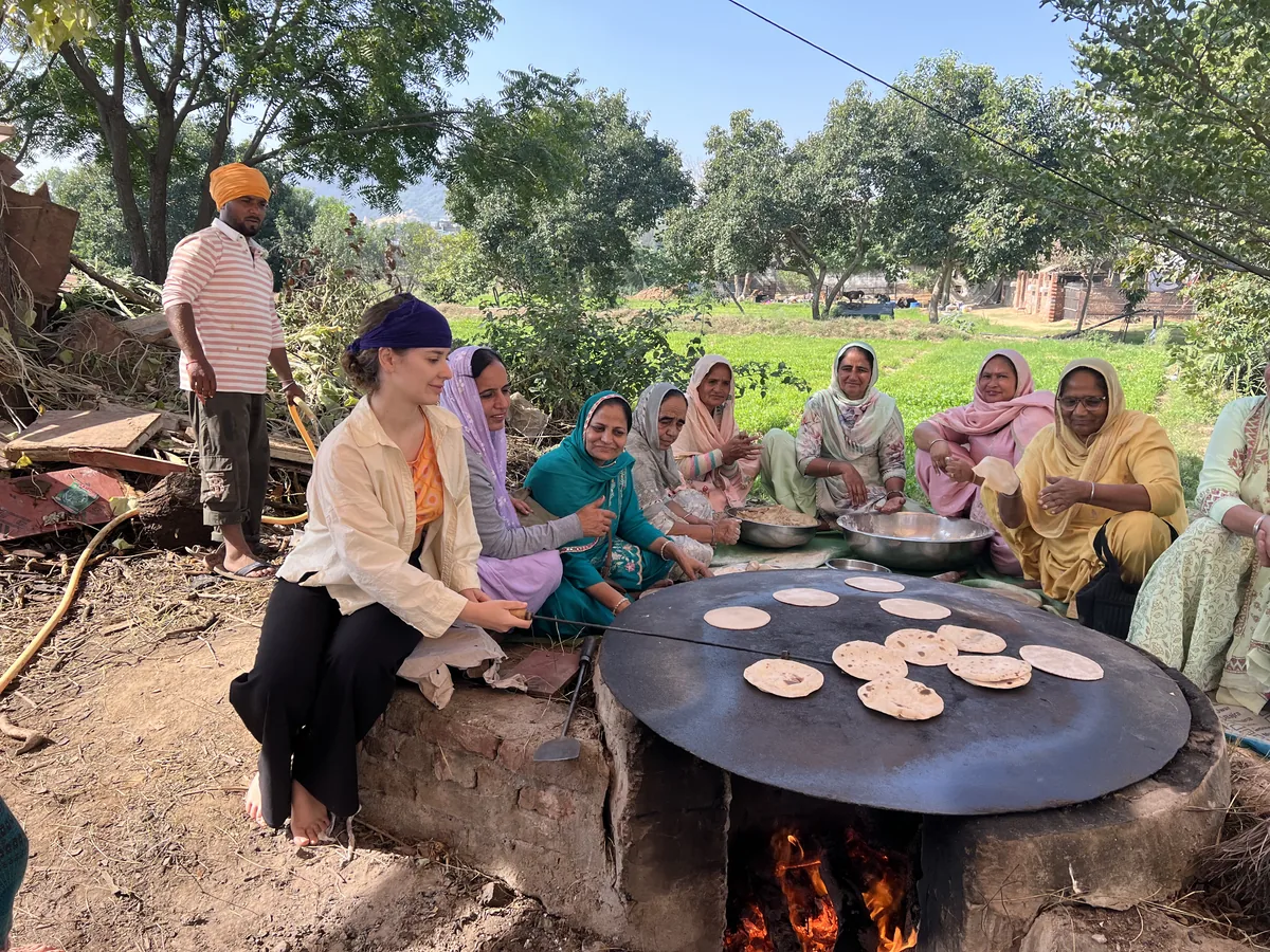 A group shares a local experience in Pushkar