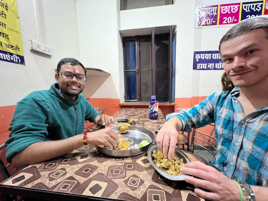 A guide introduces travellers to local food in Pushkar