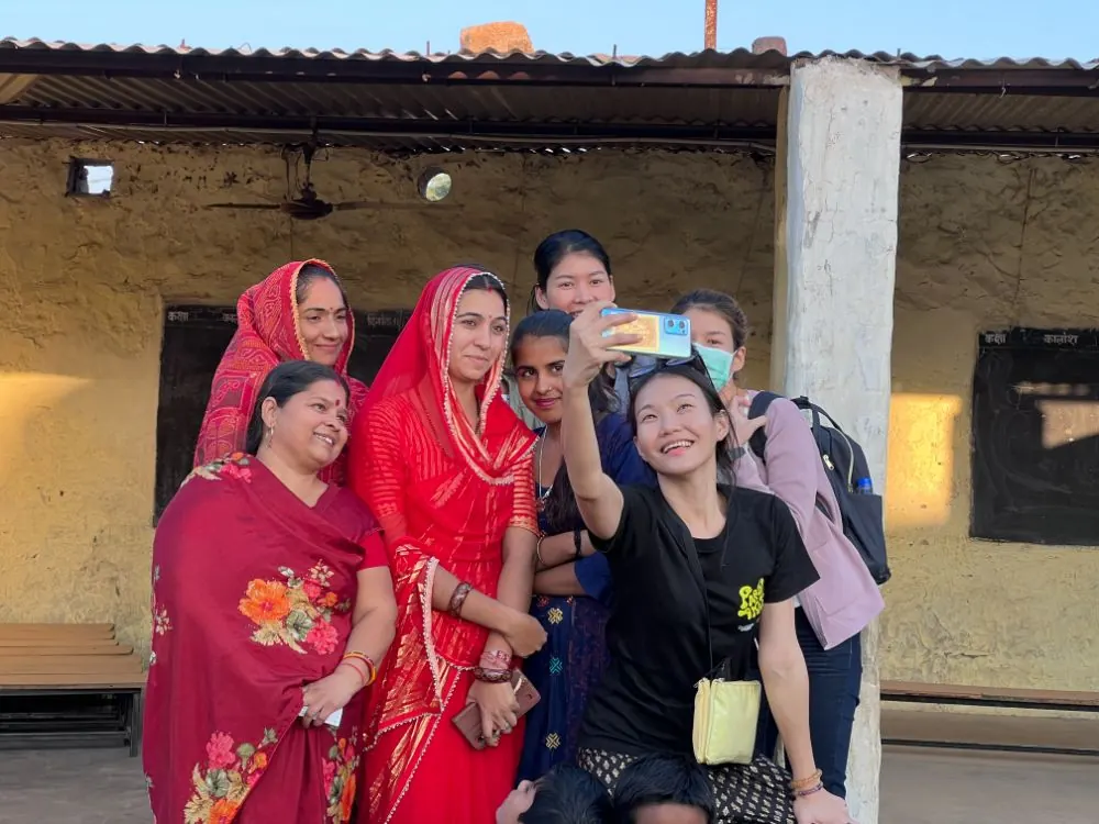 A group of visitors during a village experience near Pushkar